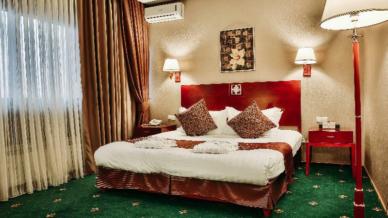 Goldman Empire Hotel Astana Bagian luar foto